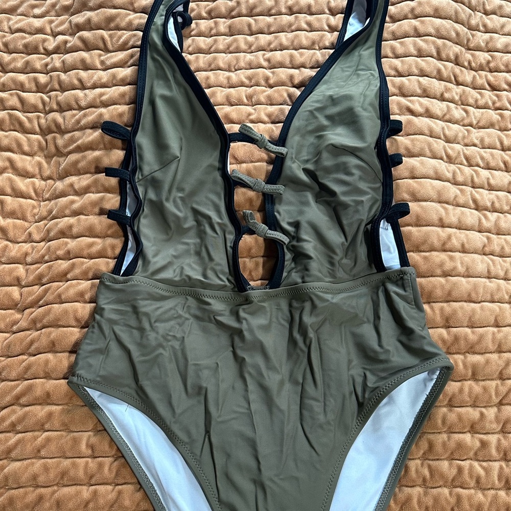 Adorable green with black edging suit!